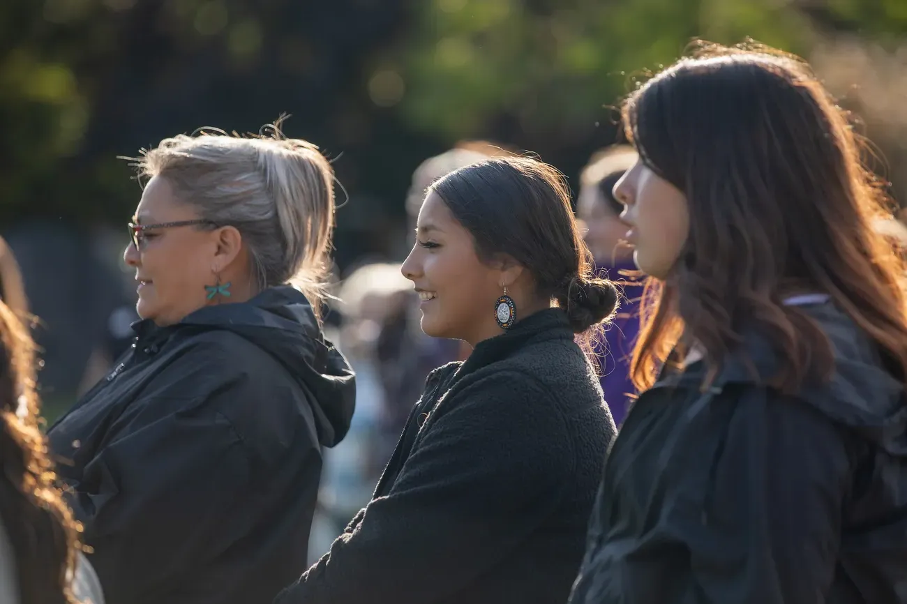 People standing together and smiling.